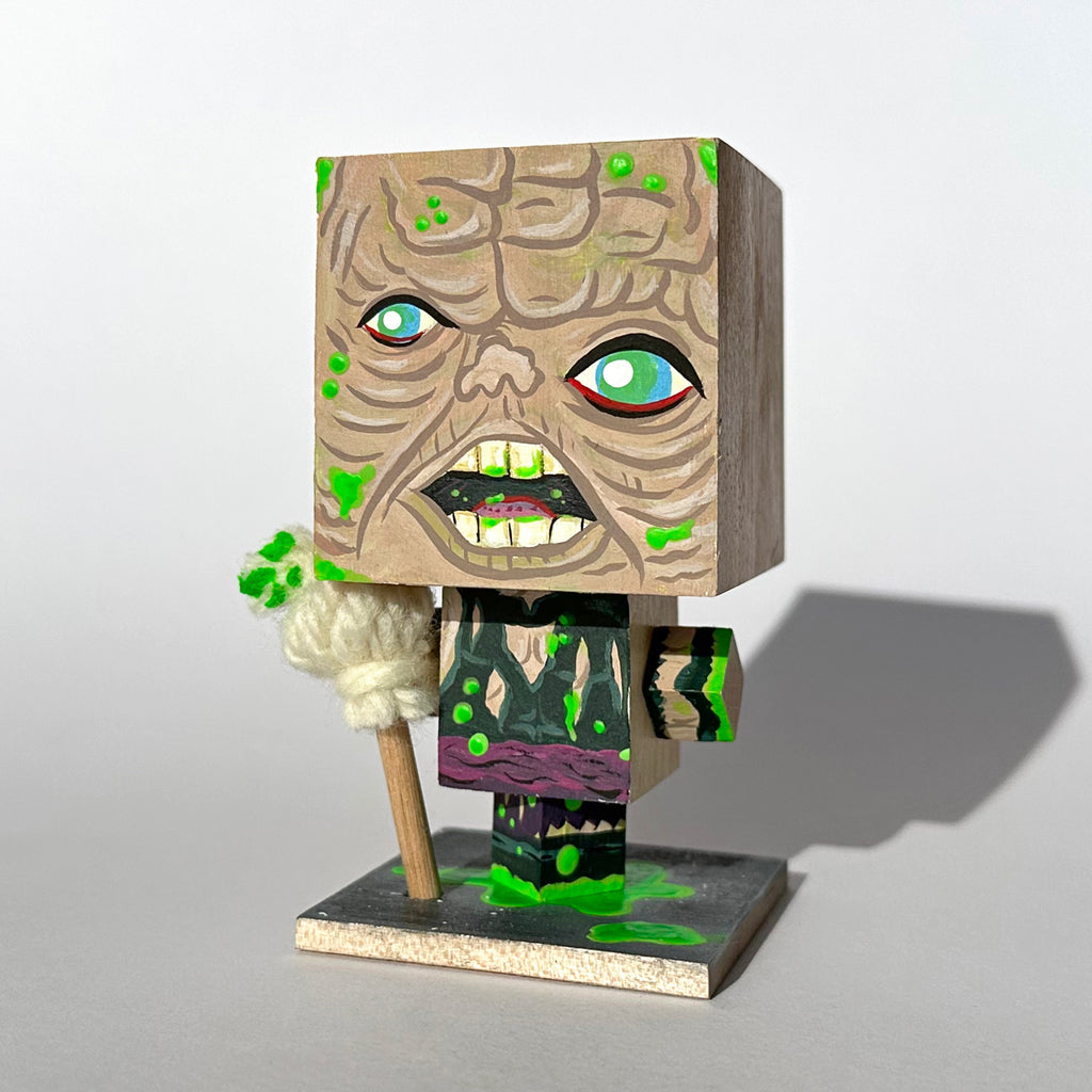 John D-C "The Toxic Avenger "Wood Head" (Plastic Free Inaction Figures)"